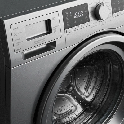 Close up of washing machine drum and control panel